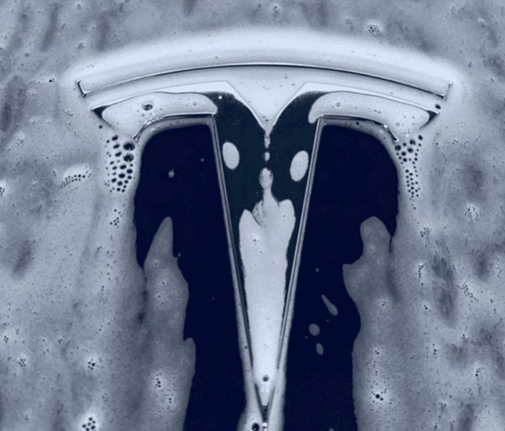 Tesla car being washed.